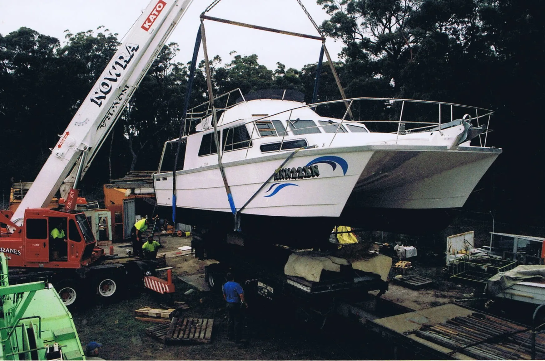 Catamaran on slings in a boatyard