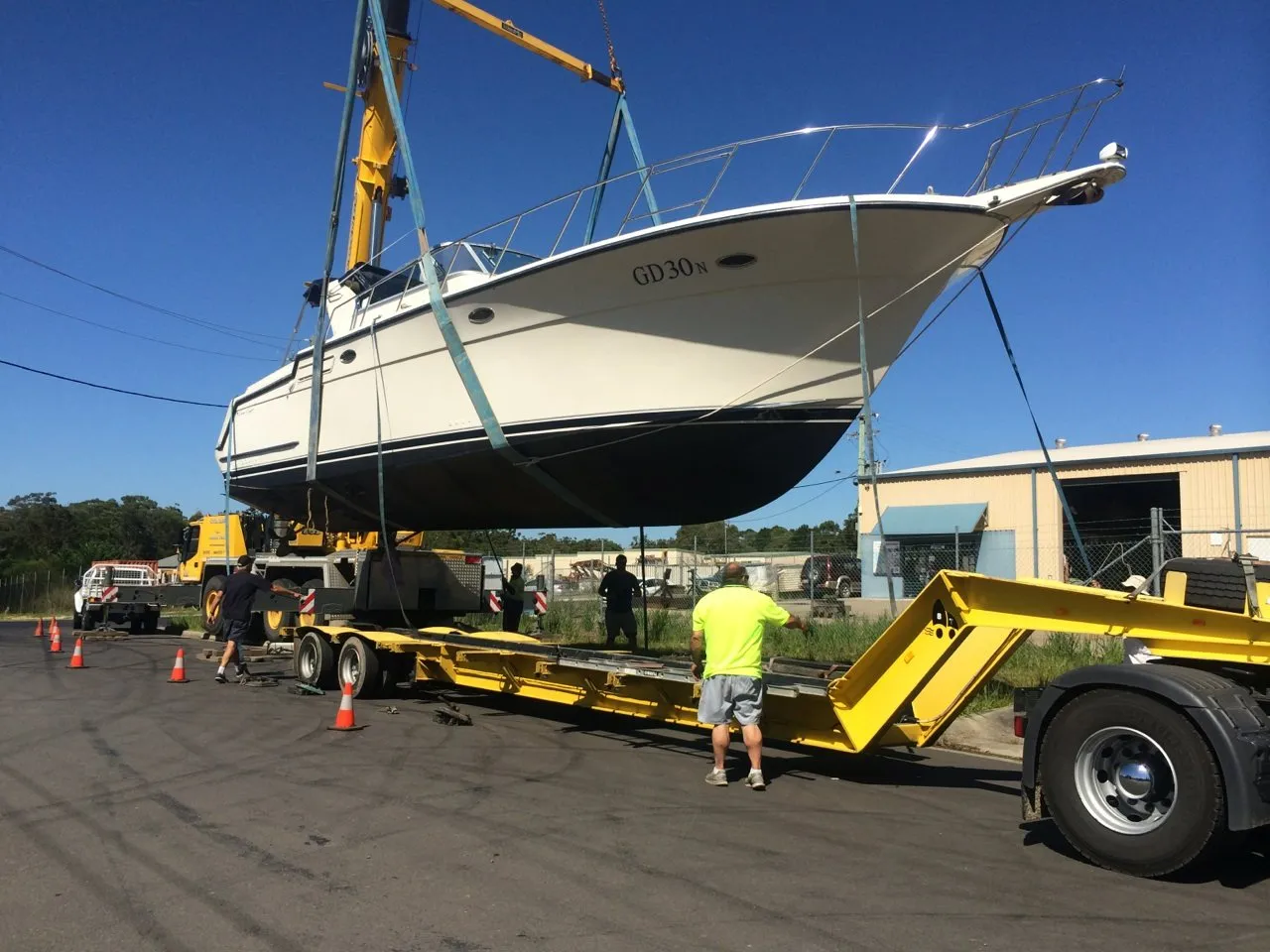 Motor cruiser lifted onto a trailer
