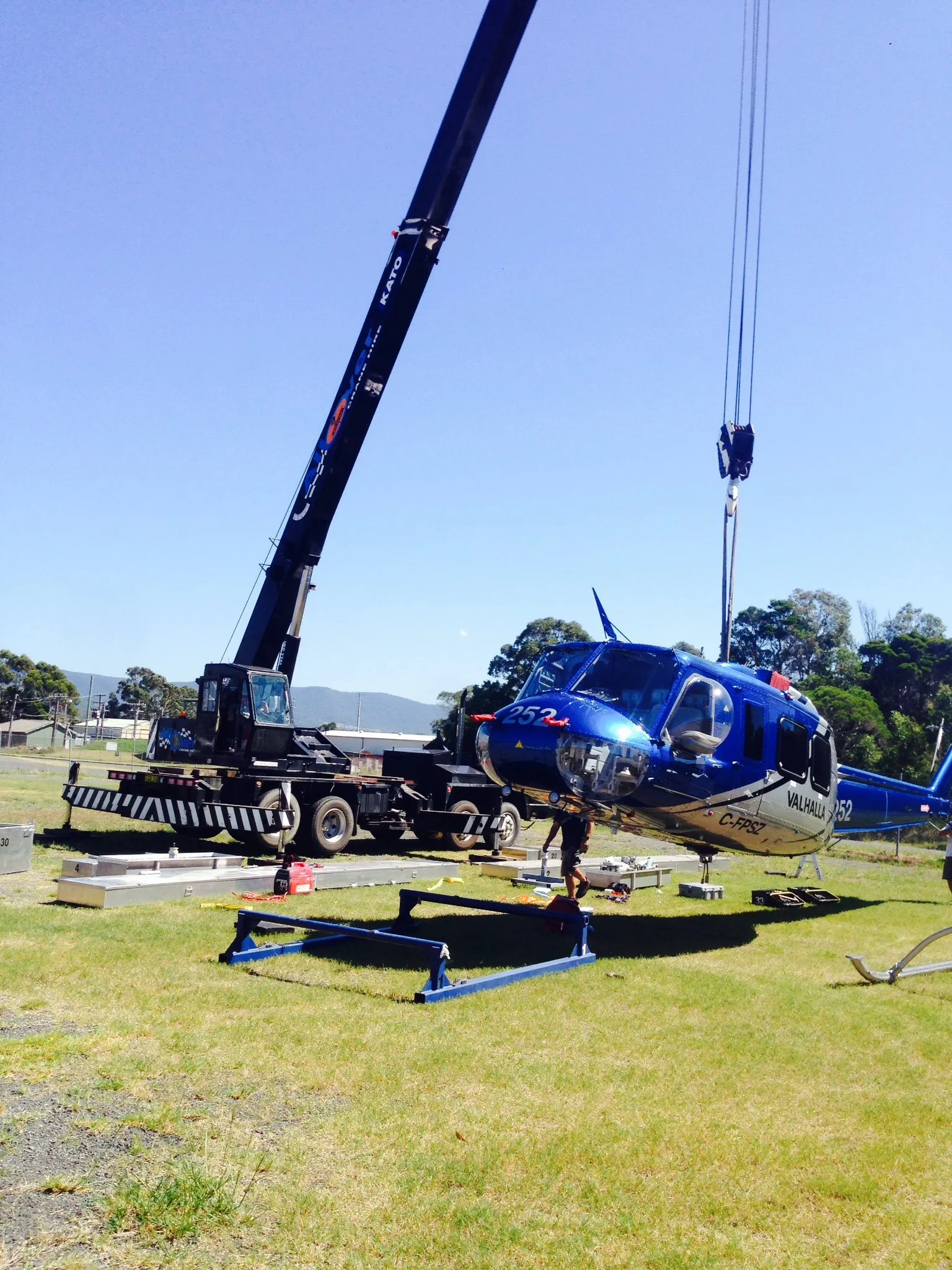 Helicopter lifted on a grass field