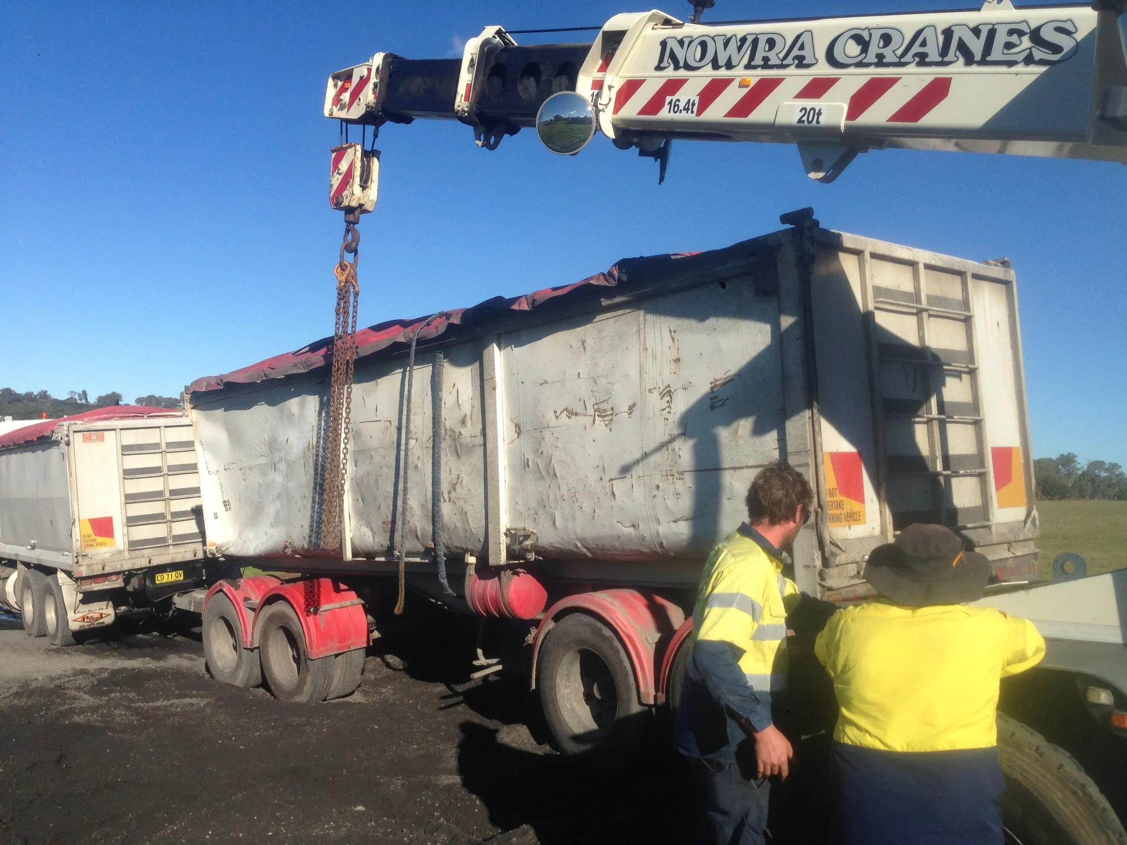 Truck body lifted by crane