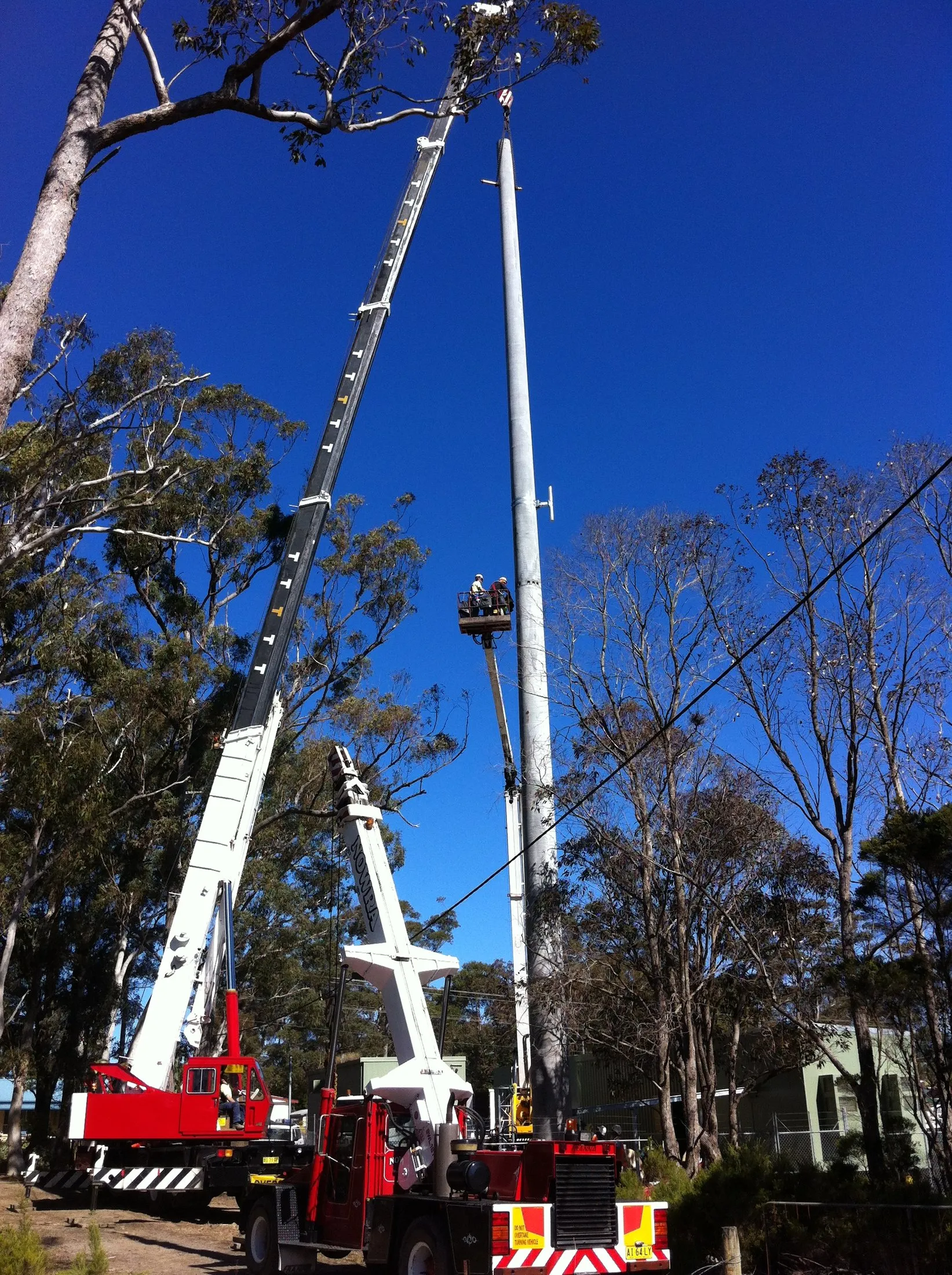 Truck crane with the boom raised