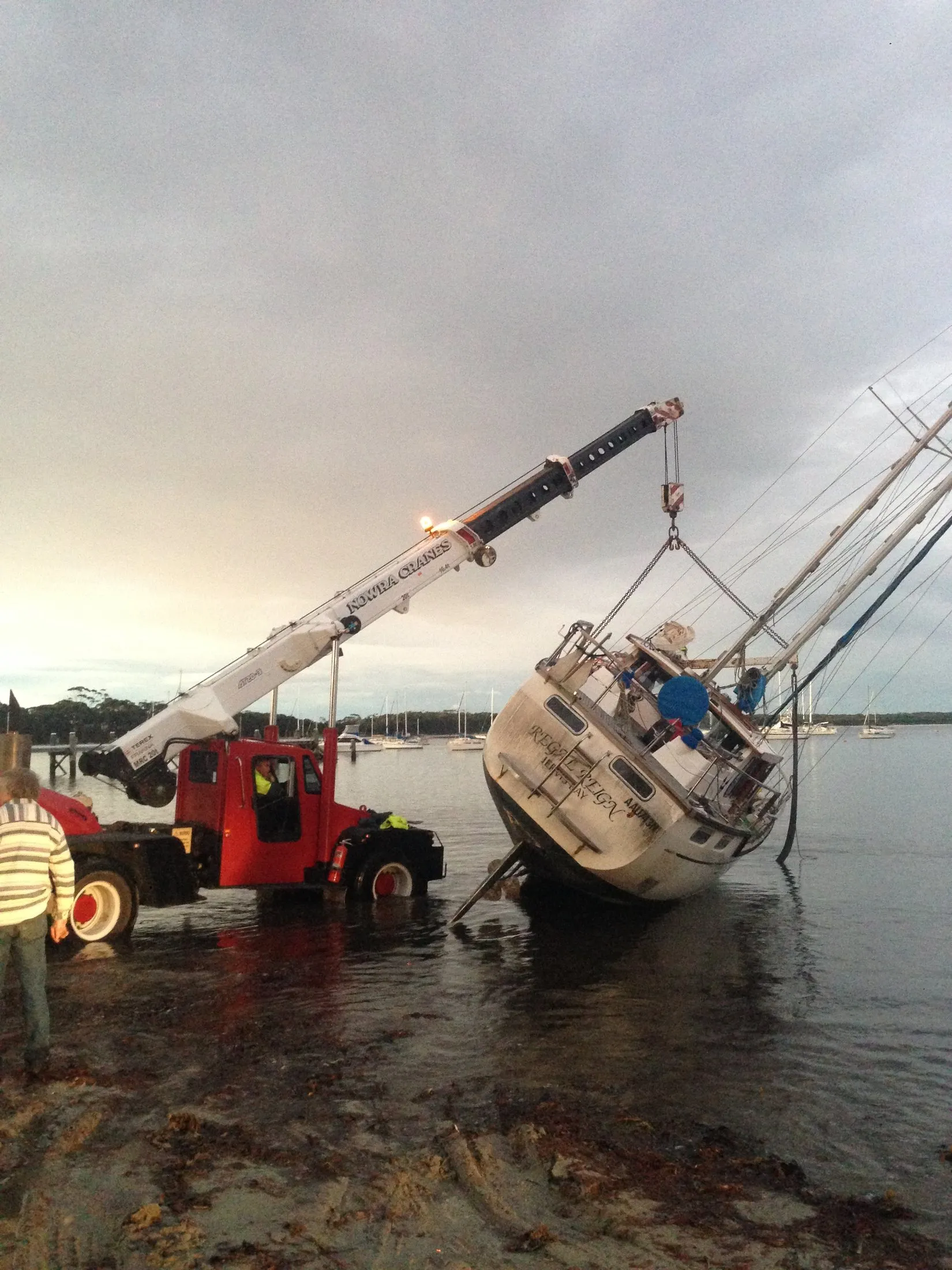 Yacht mast lifted at a marina