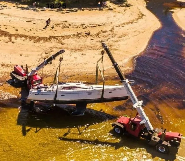 Yacht recovery on tidal sand